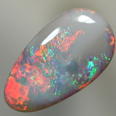 SOLID SEMI BLACK OPAL Bright red fire contrasts with green
